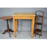 A pine school desk, ex Oundle School, cake stand and tripod table.