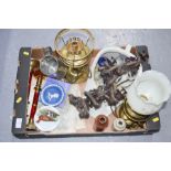 A group of items to include pair of brass candlesticks, stoneware jars, oil lamp, candelabra, maps