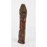 An African fetish doll carved in horn, 23cm high.