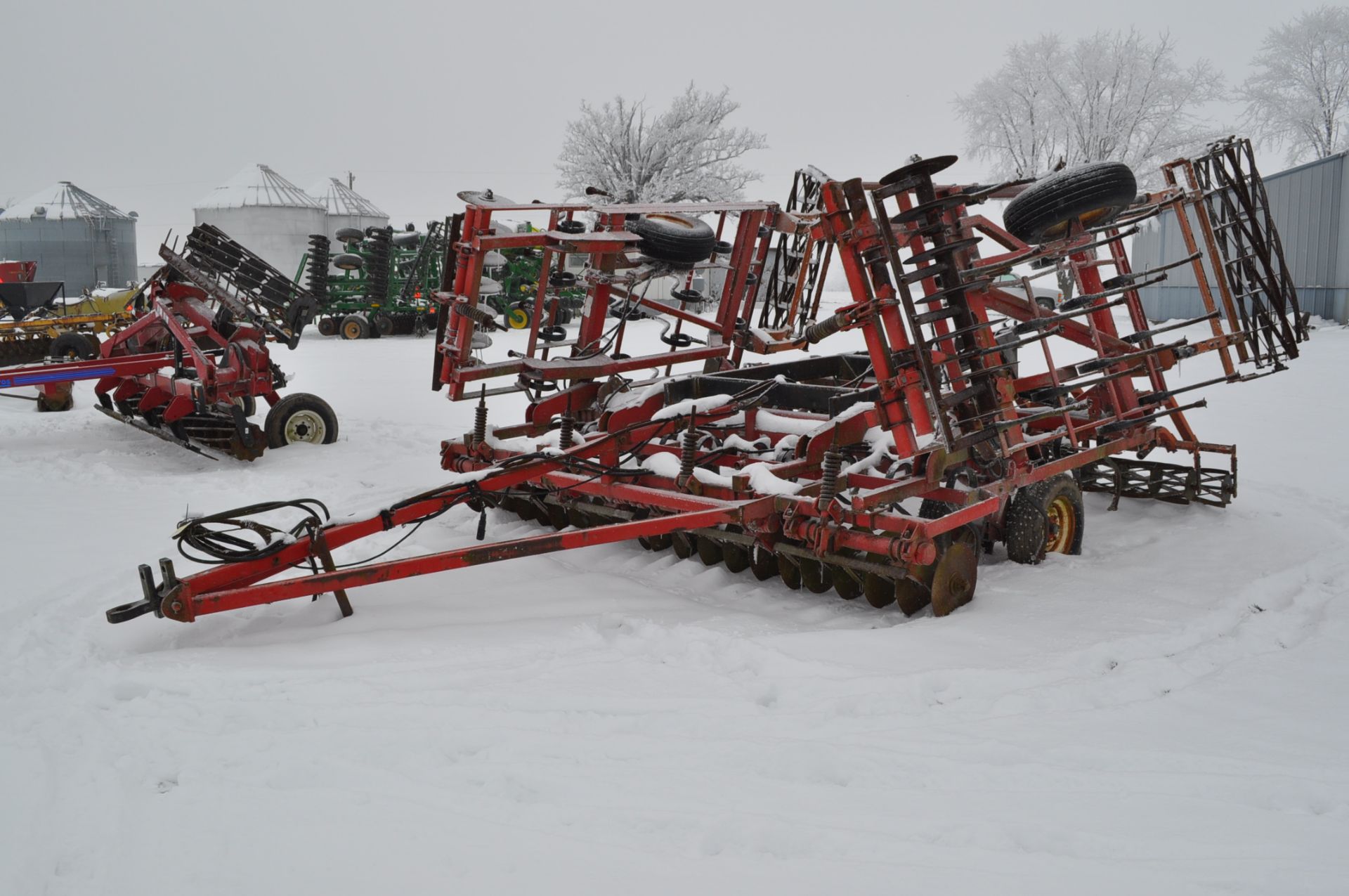 24’ Kongskilde Triple K field cultivator, Danish tine, rear hitch, double basket, walking tandems