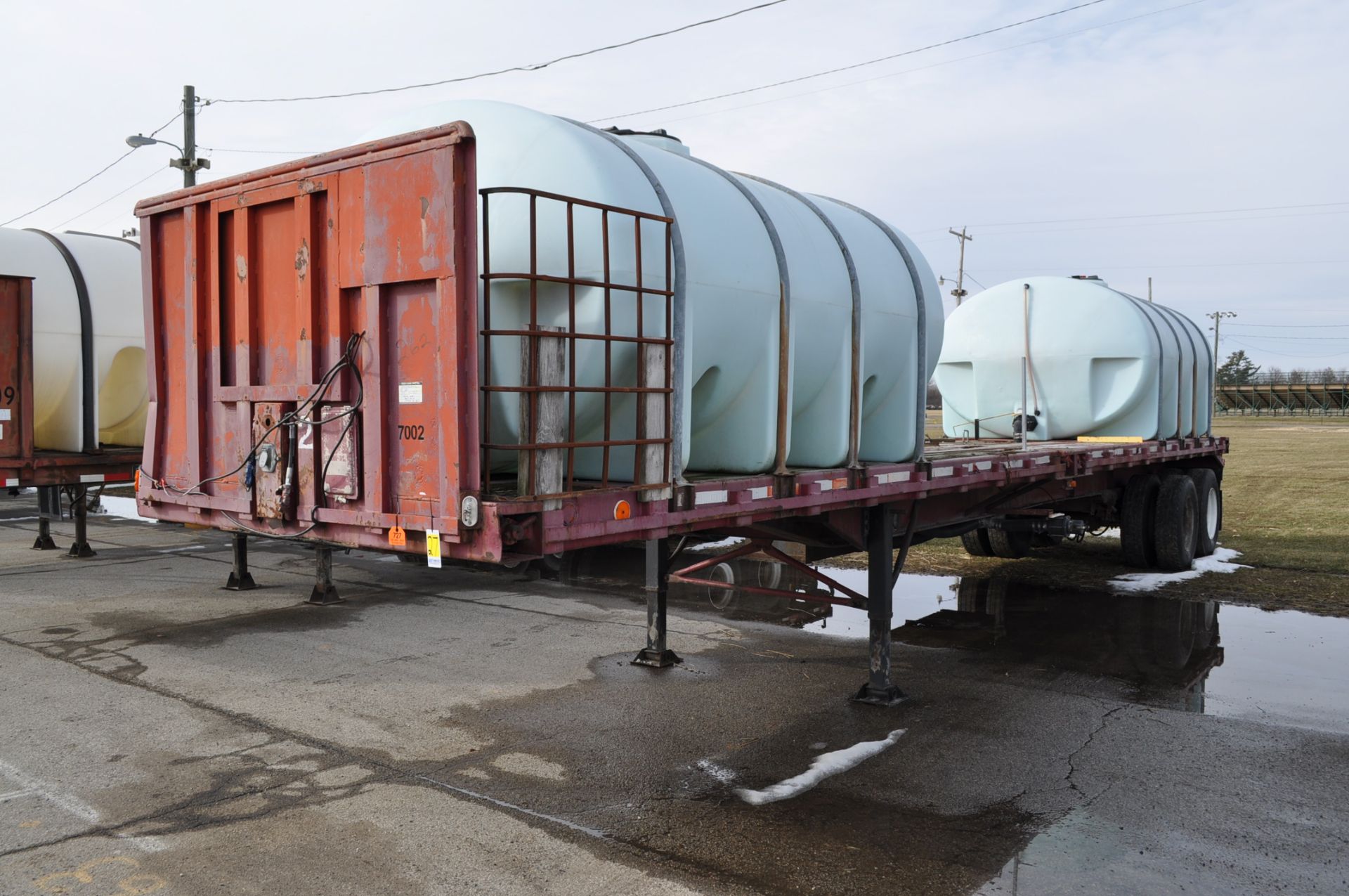 1970 Dorsey flat-trailer, 40’x96”, headache rack, (2) 2500-gal. poly leg tanks, 3” pump & motor