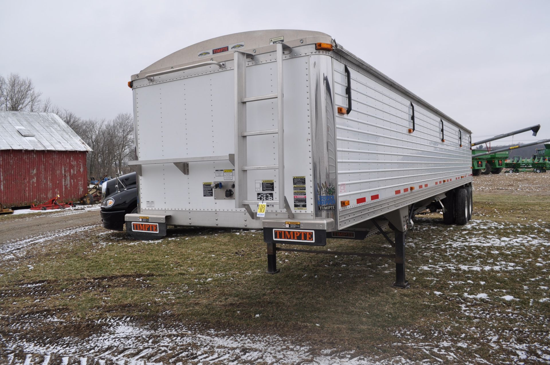 2011 Timpte 40’ hopper trailer, roll tarp, ag hopper, spring ride, 11 R 24.5 tires, 4 alum wheels,