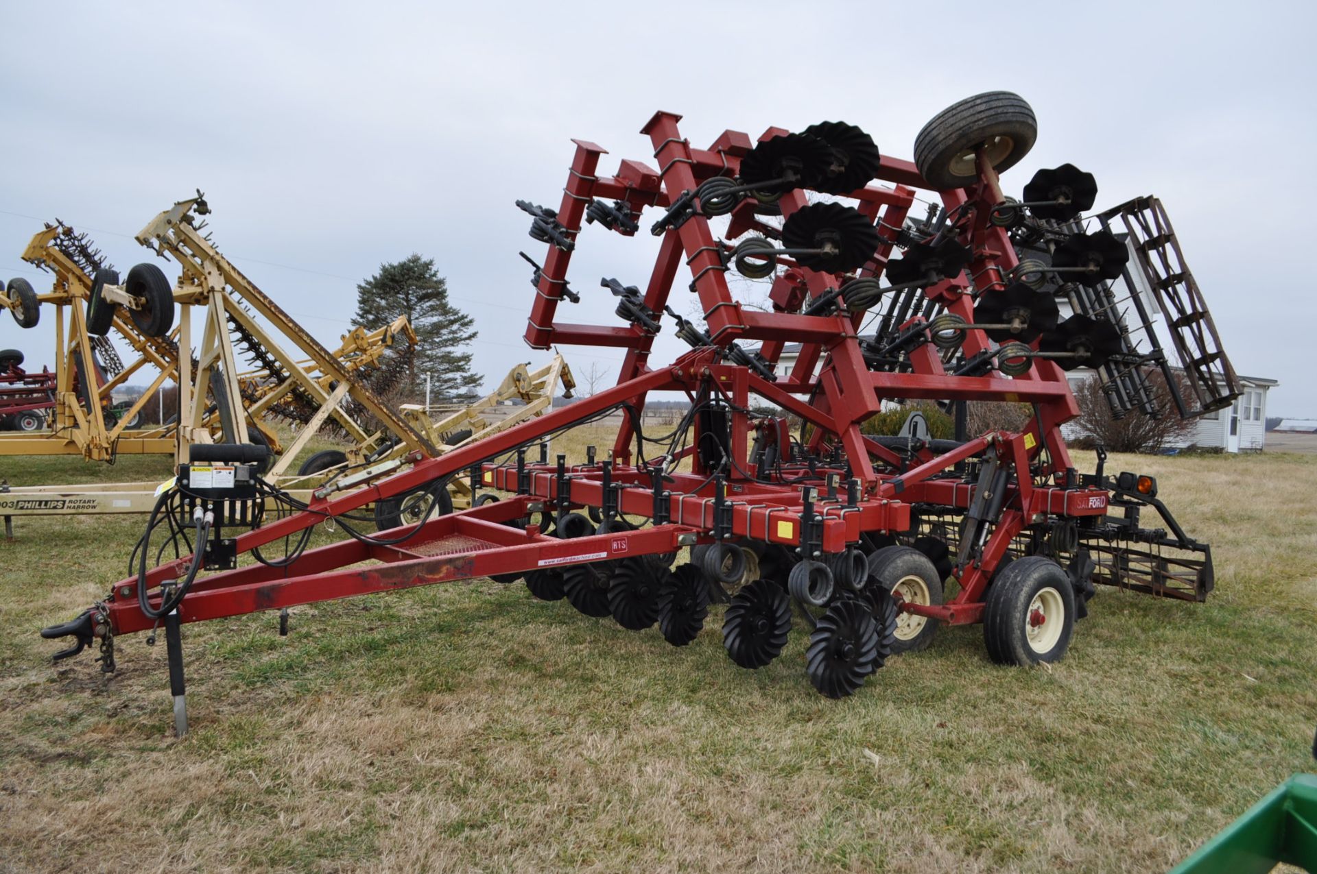 24’ Salford RTS 570 vertical till, wing weights, coil tine harrow, rolling basket, SN 092124
