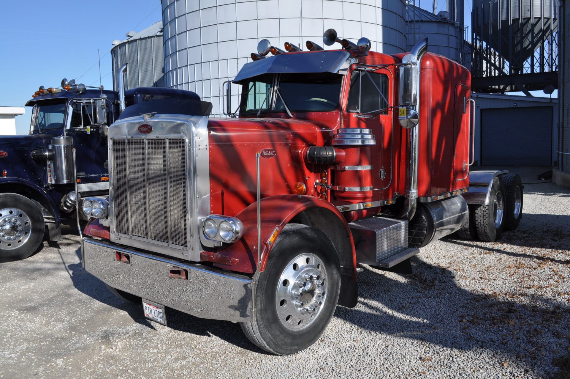 1983 Peterbilt 359 semi truck, 3406 CAT 15-spd, 242” WB, air ride, 60” flat sleeper, 11 R 24.5 tire