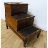 19th century mahogany library steps, the upper step with hinged cover, on short turned baluster