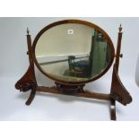 Edwardian mahogany toilet mirror, the oval plate with chequered edge stringing between tapered