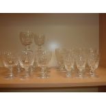 Part suite of faceted & cut table glass with bucket bowls & ball feet, comprising: twelve red wines;