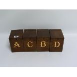 Four 19th century mahogany tea caddy boxes of rectangular form with hinged lids, labelled A.B.C. &