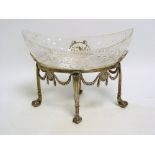 Fruit stand with oval cut glass dish upon oval base with cast swags on reeded claw & ball feet, by