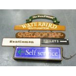 Seven items of signage, catering, restaurant, etc. incl. vintage illuminating self service sign.