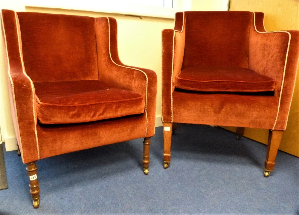Two early 19th century rectangular tub armchairs upholstered to match, one on ring turned mahogany