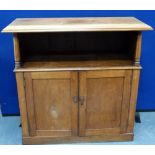 19th century mahogany side cupboard with open upper shelf above pair of single panel doors on plinth