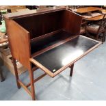 1970's Scandinavian rosewood cabinet & dry bar with ebonised surfaces & folding slope fall front on