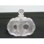 Moulded glass scent bottle of double flowerhead form, unmarked, 10cm wide & a small silver