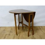 Late 20th century oval mahogany Sutherland table of typical design. 62cm wide.