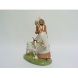 Royal Copenhagen figure of a girl with two goats, no. 694, 24cm high.