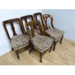 Group of five near matching Victorian walnut dining chairs similar to the previous two lots.