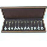 Set of twelve parcel gilt silver spoons 'R.S.P.B.', 10¼ oz, cased.