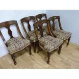 Set of five Victorian walnut dining chairs similar to the previous lot.