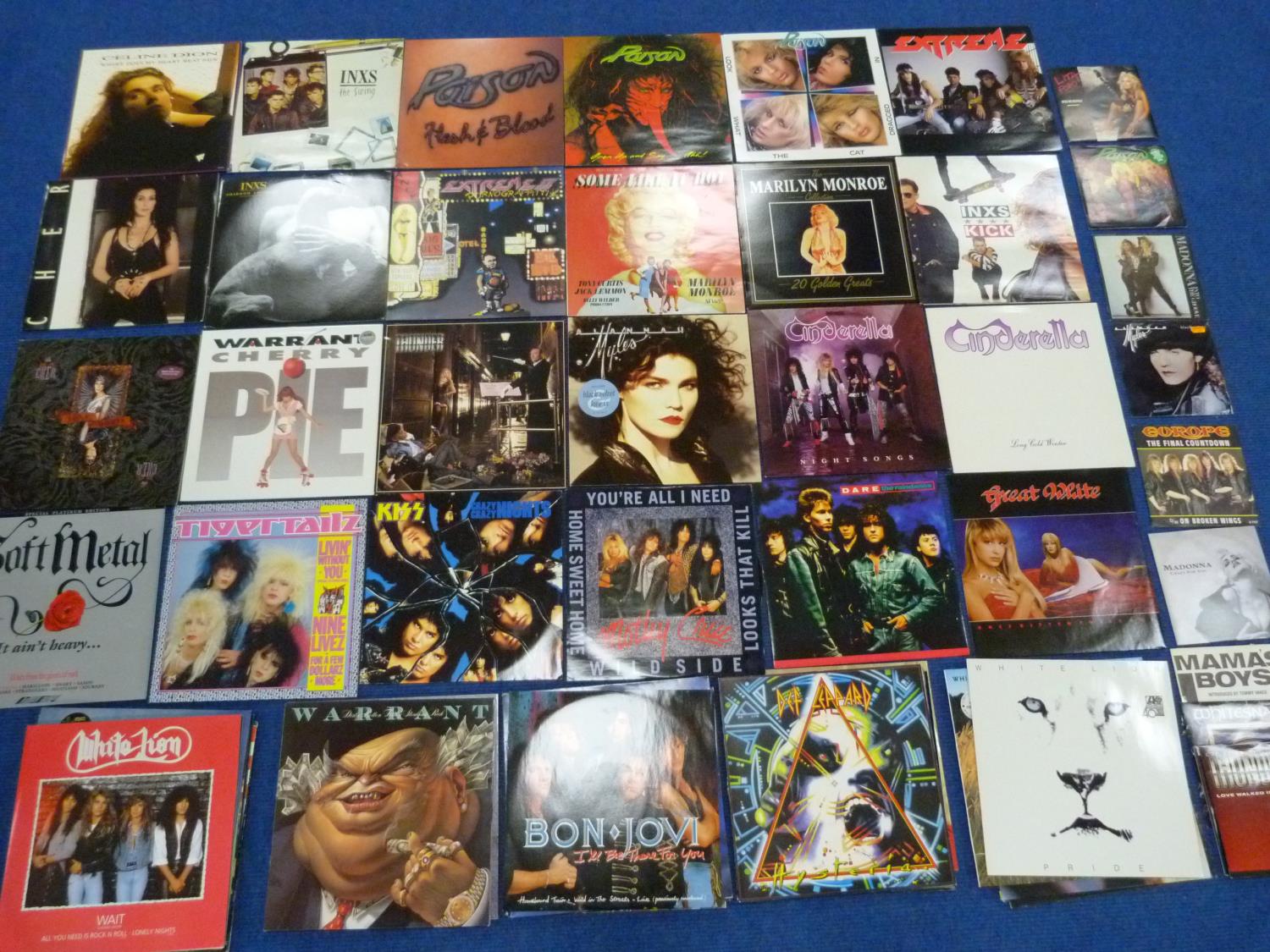 Quantity of Rock LP's to include Poison INXS and Cinderella. Also 45rpm records and two Marilyn