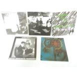 Four Cabaret Voltaire singles and a DAF single