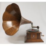 Early 20th century Beltona oak gramophone with panelled wooden oak horn. Retail plaque for "J.