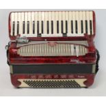 Selmer Invicta Torino piano accordion with red marbled body, serial no. 7573. No case.