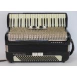 Hohner Carena IIIM piano accordion with black body, serial no. 074953, with case.