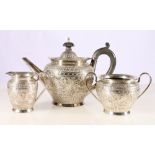 Victorian silver Bachelor's three piece tea set by James Deakin & Sons (John & William F Deakin),