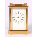19th century French brass carriage clock, the white enamelled dial with Roman and Arabic numerals,