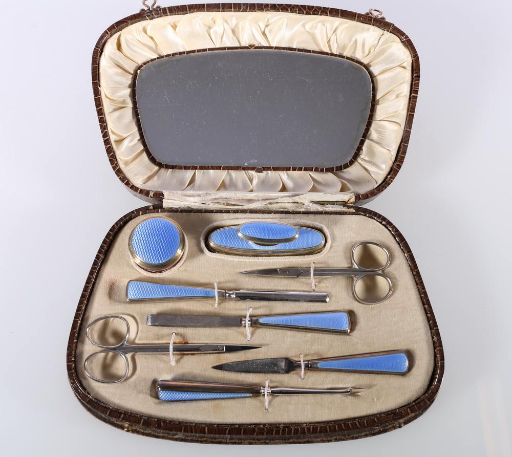 George V Art Deco silver and guilloché enamel eight-piece manicure set within fitted case by