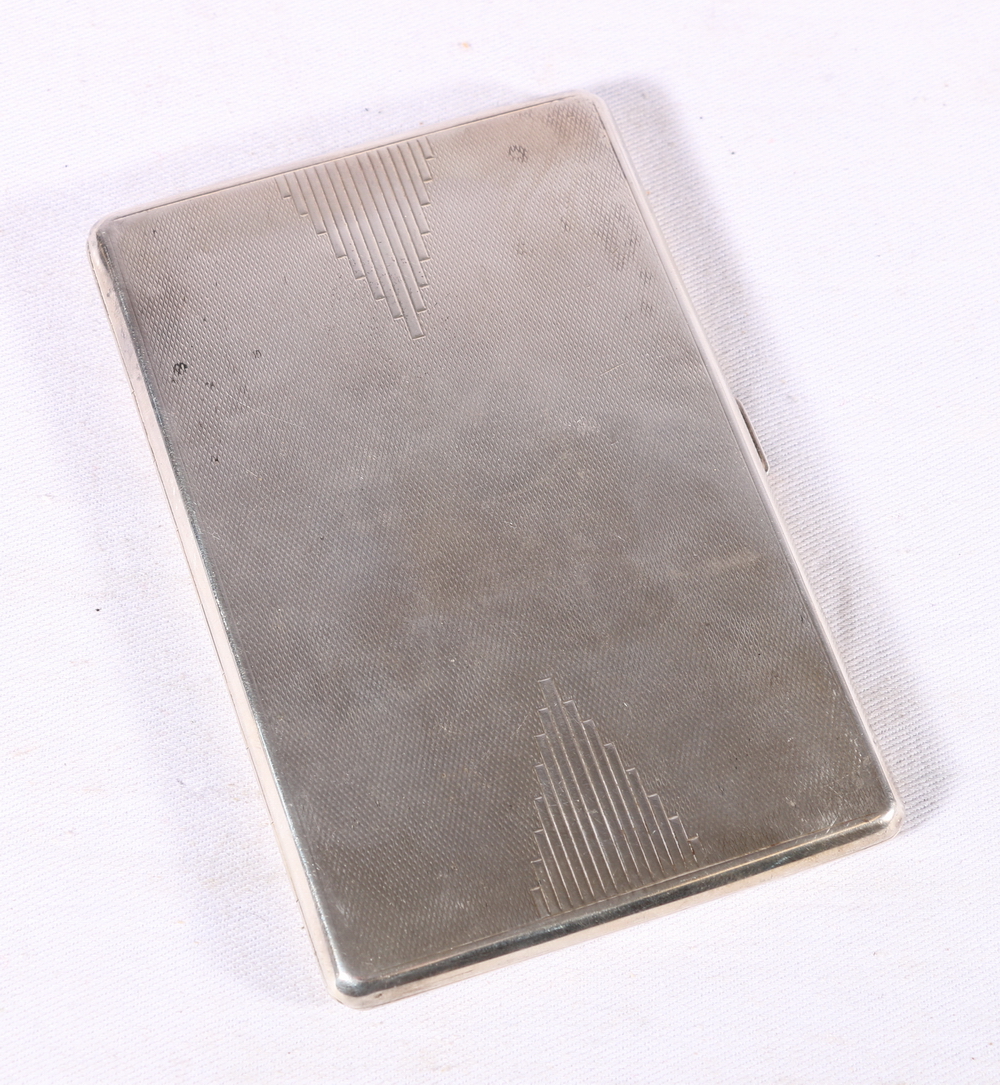 George V silver cigarette case with engine turned decoration and gilded interior by Padgett & Braham