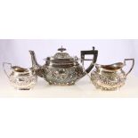 Edward VII silver three piece tea set with relief scroll, gadroon and floral decoration by William