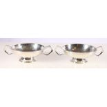 Pair of Edward VII Arts & Crafts silver quaich bowls, with hammered effect by William Hutton &