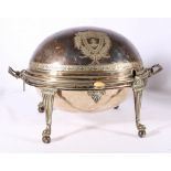 Silver plated turn-over tureen with engraved decoration, raised on paw and ball feet, 42cm wide.