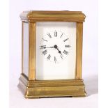 Miniature gilded brass cased carriage clock having white enamel dial with Roman numerals raised on