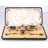 George V silver three piece condiment set by Brook & Son, 1921 Sheffield, in fitted case, retailed