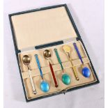 Set of six silver gilt and enameled coffee spoons stamped HJH (Henry James Hulbert) and DA (David