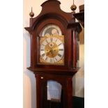 Mahogany cased longcase grandfather clock having arched top brass dial with rolling moon phase and
