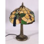 Contemporary bronzed effect table lamp with Tiffany style leaded stained glass shade, 35cm tall