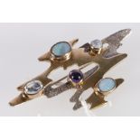 Modernist silver brooch set with opal, amethyst and moonstones, makers marks PB, 6cm wide