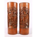 Pair of Chinese bamboo brush washer pots with incised carved decoration, 32cm tall