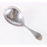 Levi & Salaman silver caddy spoon, the bowl with floral decoration, dated 1909.
