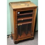 Victorian rosewood and inlaid music cabinet with single glazed panel door, brass rail gallery,