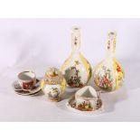 A group of eight Dresden porcelain items including a pair of bottle vases, ginger jar and cover,