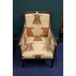 Mahogany upholstered armchair raised on block supports, 89 cm tall