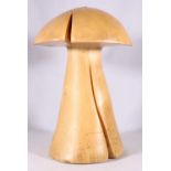Carved spalted wood model of a mushroom, signed to base WL, 40cm tall