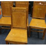 Set of four oak ecclesiastical side chairs with quatrefoil designs