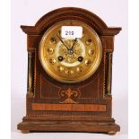 Oak and inlaid mantel clock with french movement, 20cm wide.