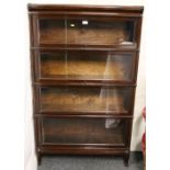 Mahogany Globe-Wernicke four section glazed bookcase, raised on cabriole supports, height 144 cm x